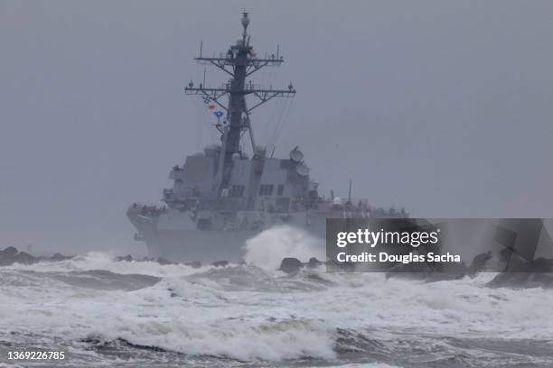 military ship sailing into the storm - us warship stock pictures, royalty-free photos & images