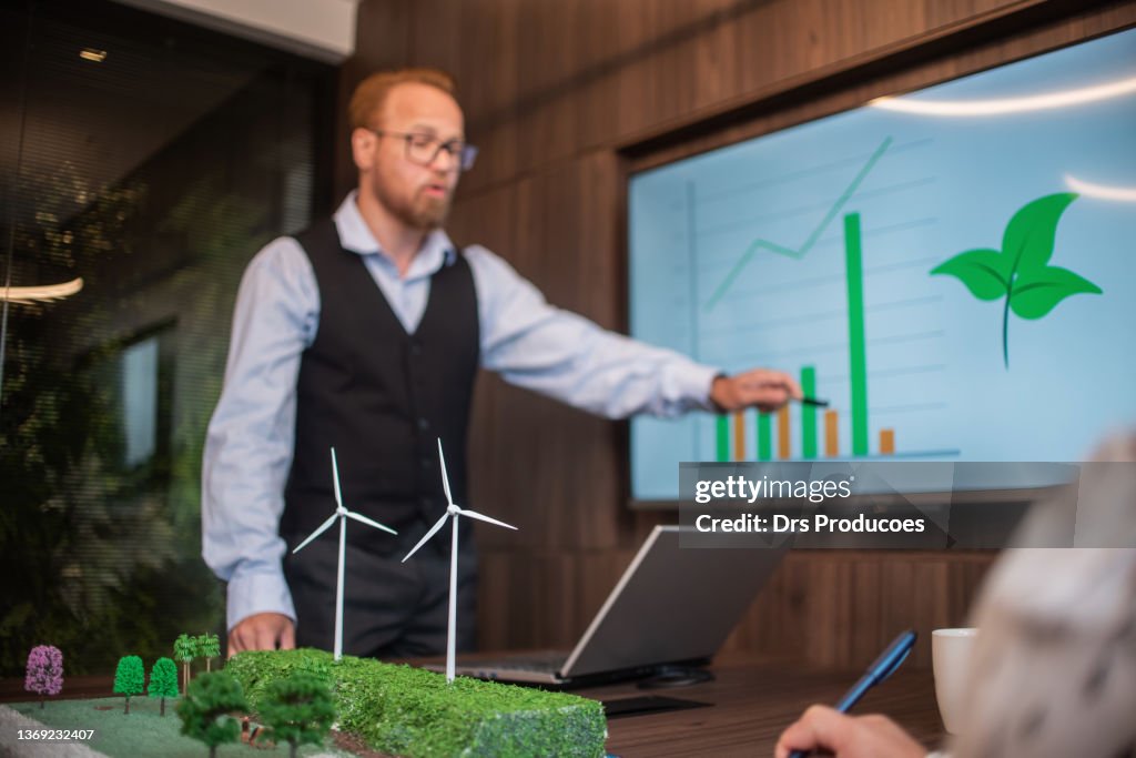 Businesspeople talking about renewable energy