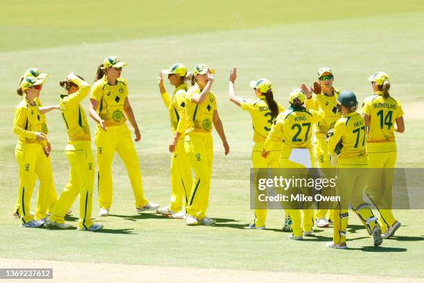 Australia celebrate at the end of the first innings during game three of the Women's Ashes One Day International series between Australia and England...