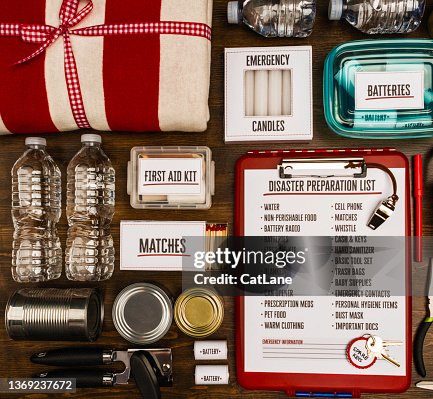 Flat lay of a collection of items for disaster preparedness and emergency planning Flat lay of a collection of items for disaster preparedness and emergency planning