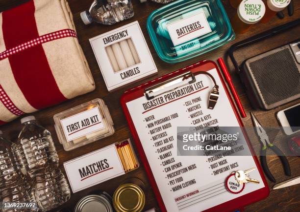 flat lay of a collection of items for disaster preparedness and emergency planning - survival kit stock pictures, royalty-free photos & images