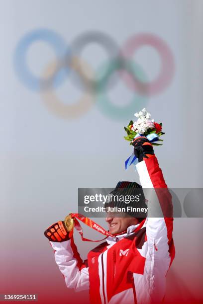 Gold medallist Matthias Mayer of Team Austria celebrates during the Men's Super-G medal ceremony on day four of the Beijing 2022 Winter Olympic Games...