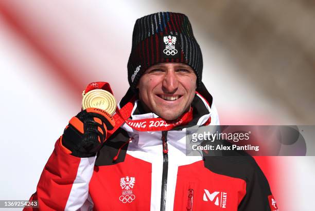 Gold medallist Matthias Mayer of Team Austria celebrates during the Men's Super-G medal ceremony on day four of the Beijing 2022 Winter Olympic Games...