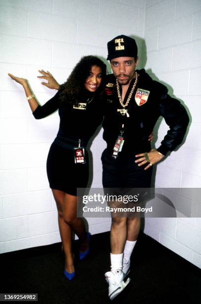 Rapper and actor Ice-T poses for photos with his girlfriend Darlene Ortiz backstage after his performance at the Genesis Convention Center in Gary,...