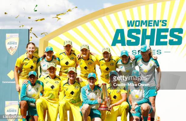 Australia celebrates winning game three and the Women's Ashes One Day International series between Australia and England at Junction Oval on February...