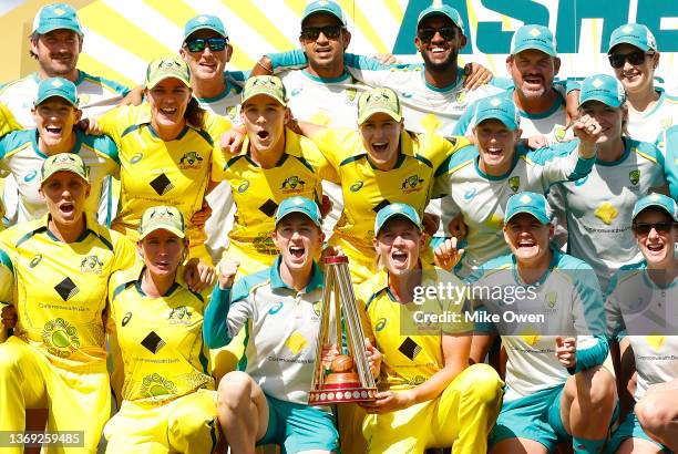 Australia celebrates winning game three and the Women's Ashes One Day International series between Australia and England at Junction Oval on February...