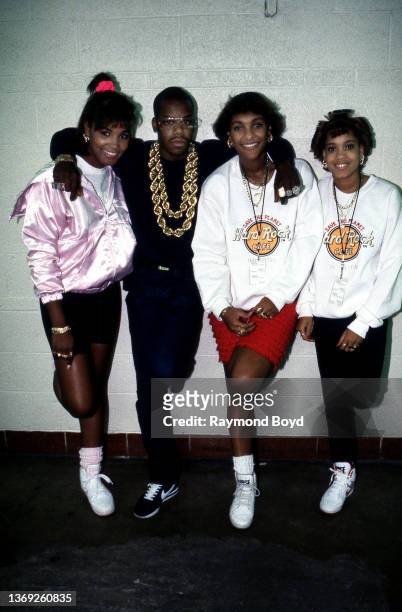 Rappers Stacy Phillips, MC JB and Baby D. Of JJ Fad poses for photos with rapper Too Short backstage after their performance at the Genesis...