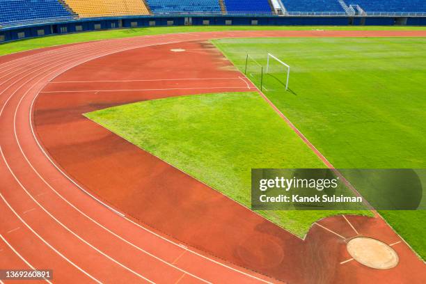 aerial top view of running track - 陸上競技場　無人 ストックフォトと画像