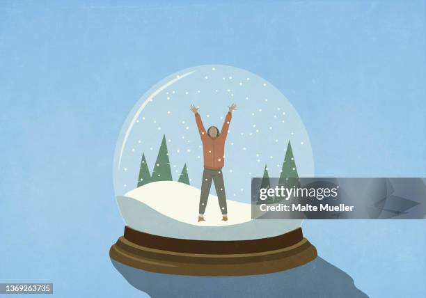 woman with arms raised inside snow globe - snow globe stock-grafiken, -clipart, -cartoons und -symbole