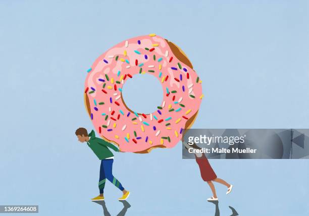 illustrations, cliparts, dessins animés et icônes de boy and girl carrying large donut with sprinkles on blue background - temptation