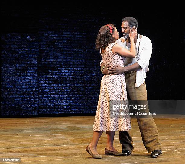 Actors Audra McDonald and Norm Lewis onstage during the curtain call at "The Gershwins' Porgy and Bess" Broadway opening night at the Richard Rodgers...