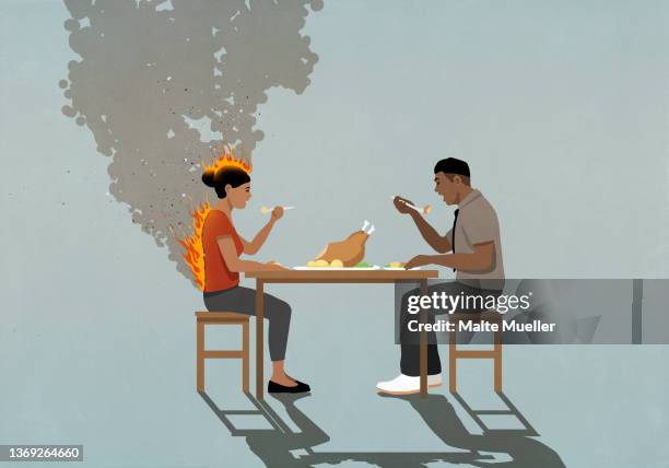 oblivious couple eating turkey dinner at table with woman's back on fire - husband stock illustrations