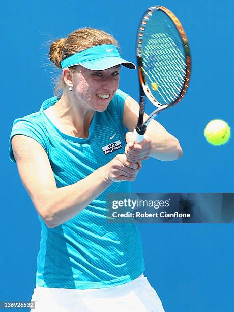 Mona Barthel of Germany returns a shot to Angelique Kerber of Germany during the singles semi final match on day six of the 2012 Hobart International...