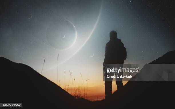 watching beautiful planets and stars - saturn planet stock pictures, royalty-free photos & images