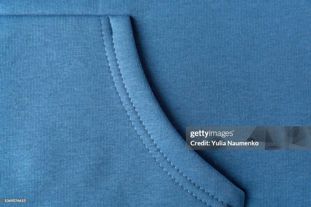 Pocket on fabric. Comfortable pocket close-up. Fabric pocket, soft and warm fabric.