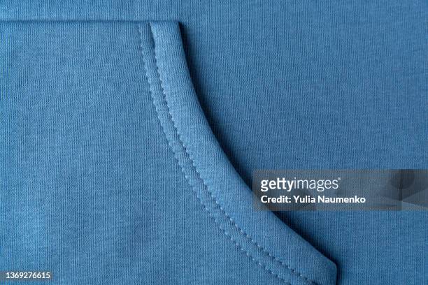 pocket on fabric. comfortable pocket close-up. fabric pocket, soft and warm fabric. - kapuzenoberteil stock-fotos und bilder