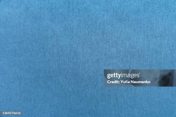 warm and soft fabric as background. blue fabric. - sweatshirt stock pictures, royalty-free photos & images
