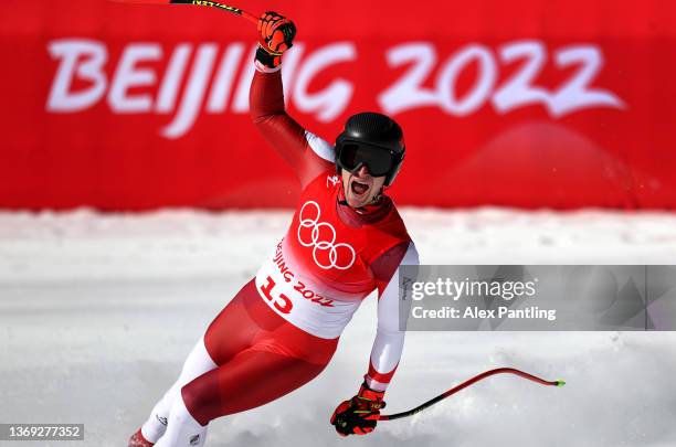 Matthias Mayer of Team Austria reacts as they cross the finish line during the Men's Super-G on day four of the Beijing 2022 Winter Olympic Games at...