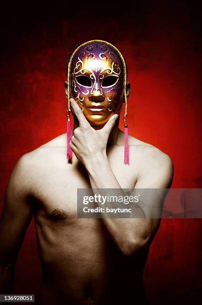 man with mask - masquerade mask stock pictures, royalty-free photos & images