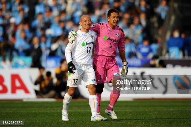Yukio Tsuchiya and Yoichi Doi of Tokyo Verdy react after the 1-1 draw in the J.League J1 match between Kawasaki Frontale and Tokyo Verdy at Todoroki...
