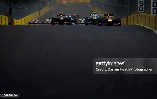 Brazilian Scuderia Ferrari Formula One team racing driver Felipe Massa driving his F138 racing car at speed at the exit of the Spoon Curve during...