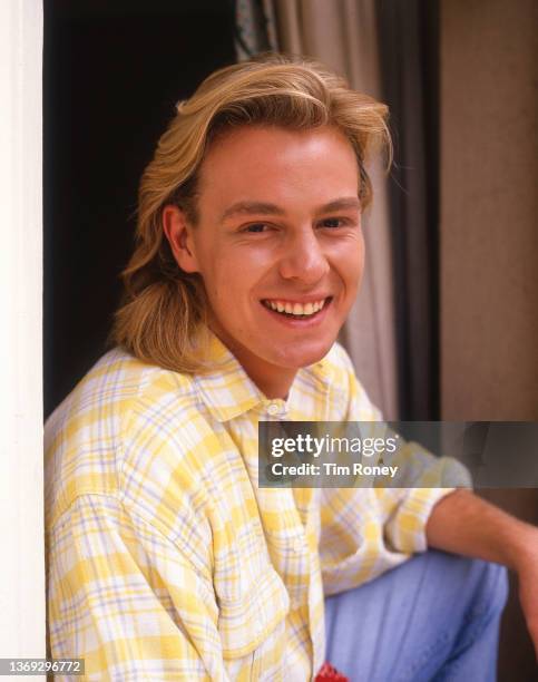 Actor and singer Jason Donovan, then playing the character of Scott Robinson in Australian TV soap opera 'Neighbours', United Kingdom, circa 1988.