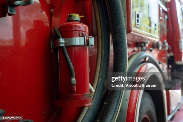 firemen equipment on fire truck,fire engine with equipment stay in the fire department. - gas pump help stock pictures, royalty-free photos & images