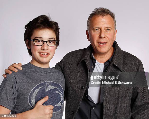 Comedians Joey Bragg and Paul Reiser pose after their performances at The Ice House Comedy Club on January 12, 2012 in Pasadena, California.