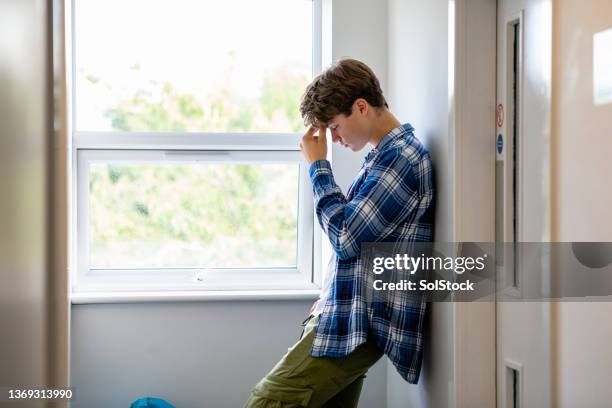 struggling with personal issues - stressed student stock pictures, royalty-free photos & images