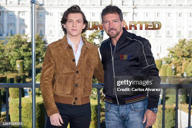 Actors Tom Holland and Antonio Banderas attend 'Uncharted' photocall at the Royal Theater on February 08, 2022 in Madrid, Spain.