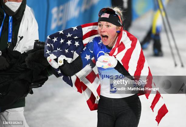 Jessie Diggins of United States celebrates her Bronze Medal during the Women's Cross-Country Sprint Free Final on Day 4 of the Beijing 2022 Winter...
