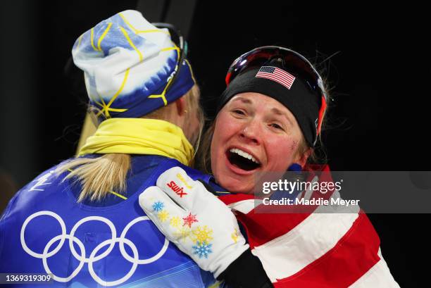 Bronze medalist, Jessie Diggins of Team United States celebrates with Gold medalist, Jonna Sundling of Team Sweden following the Women's...