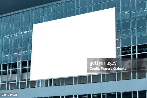 billboard on the modern building. mock-up - billboard in city stock-fotos und bilder