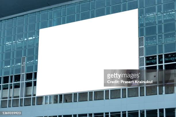 billboard on the modern building. mock-up - billboard mockup stock pictures, royalty-free photos & images