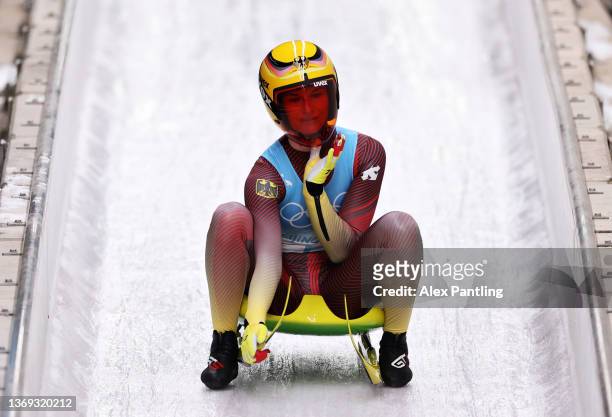 Julia Taubitz of Team Germany reacts after her Women's Singles Luge Run 3 on day four of the Beijing 2022 Winter Olympic Games at National Sliding...
