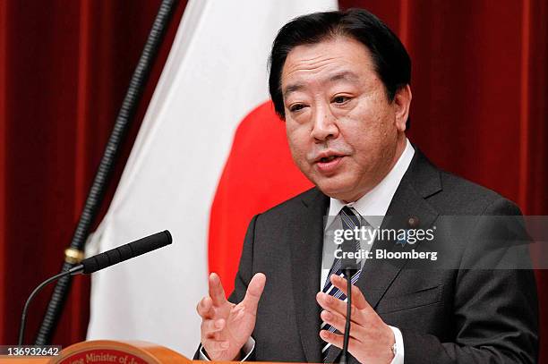 Yoshihiko Noda, Japan's prime minister, gestures during a news conference at the prime minister's official residence in Tokyo, Japan, on Friday, Jan....