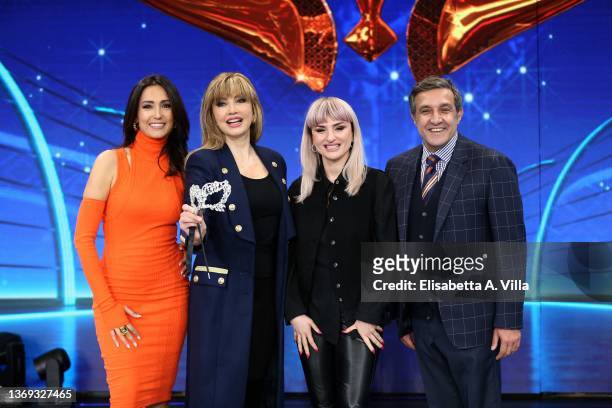 Caterina Balivo, Milly Carlucci, Arisa and Flavio Insinna attend the photocall of the tv show "Il Cantante Mascherato" at Auditorium Rai on February...