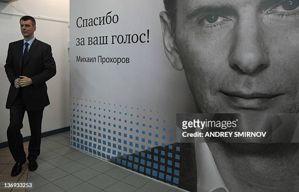 Billionaire Mikhail Prokhorov arrives for a meeting with his supporters who signed the petition collecting signatures for Prokhorov's registrations...