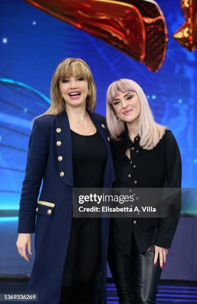 Milly Carlucci and Rosalba Pippa aka Arisa attend the photocall of the tv show "Il Cantante Mascherato" at Auditorium Rai on February 08, 2022 in...