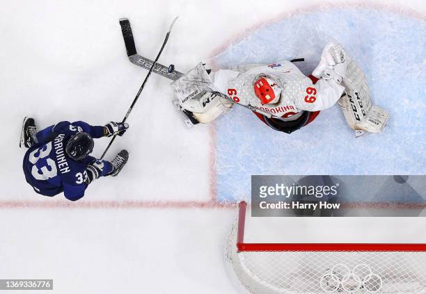 Orward Michelle Karvinen of Team Finland scores a goal against goalkeeper Maria Sorokina of Team ROC in the first period during the Women's...