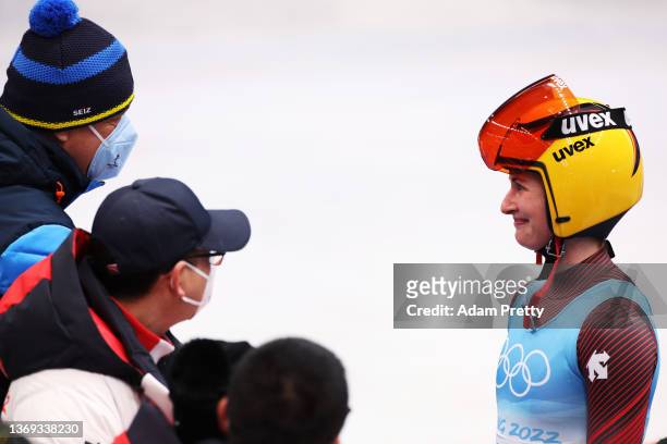 Julia Taubitz of Team Germany reacts after her Women's Singles Luge Run 4 on day four of the Beijing 2022 Winter Olympic Games at National Sliding...