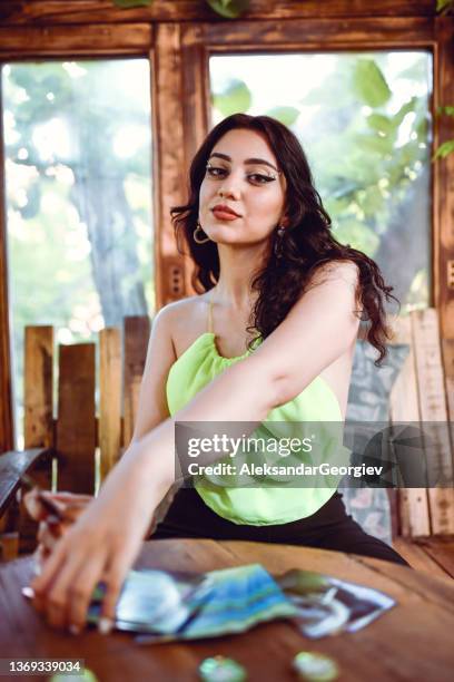 gypsy female opening tarot cards - tarot card back stock pictures, royalty-free photos & images