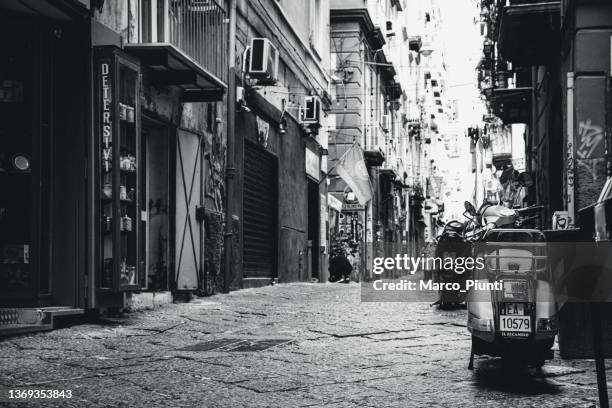 naples street in downtown district street style - vespa scooter stockfoto's en -beelden