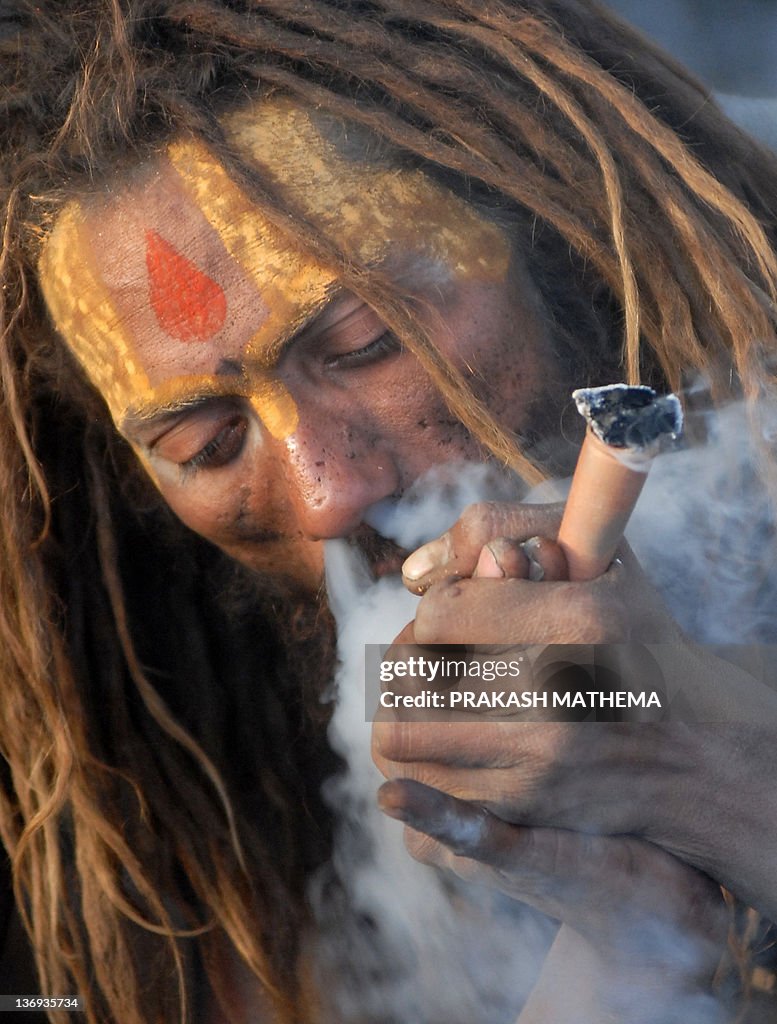 A Sadhu smokes ganja in a chillum as a holy offering from Lord Shiva,...  News Photo - Getty Images