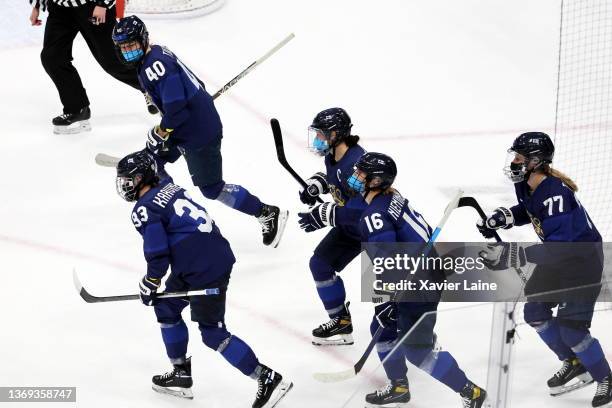 Michelle Karvinen of Team Finland celebrate his goal with teammates during the Women's Preliminary Round Group A match at National Indoor Stadium on...