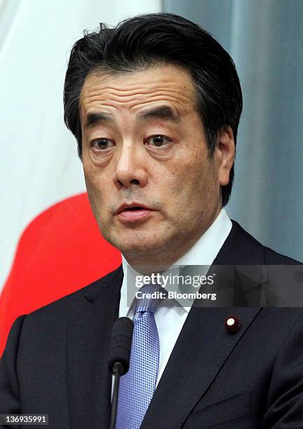 Katsuya Okada, Japan's newly-named deputy prime minister, speaks during a news conference at the prime minister's official residence in Tokyo, Japan,...