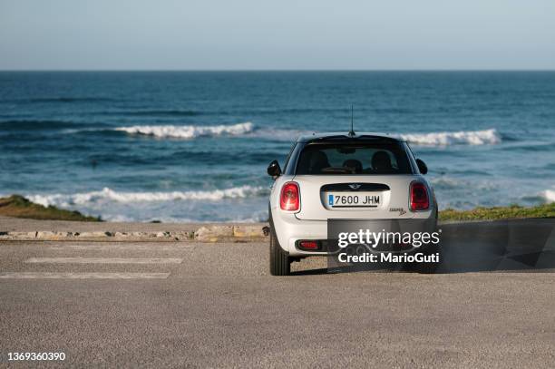 mini cooper by the sea - cooper stock pictures, royalty-free photos & images