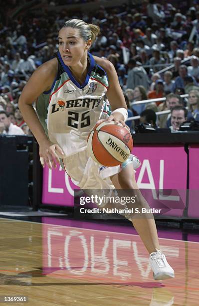 Becky Hammon of the New York Liberty drives to the basket during Game one of the 2002 WNBA Finals against the Los Angeles Sparks on August 29, 2002...