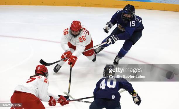 Yekaterina Dobrodeyeva of Team ROC in action with Minnamari Tuominen of Team Finland during the Women's Preliminary Round Group A match at National...