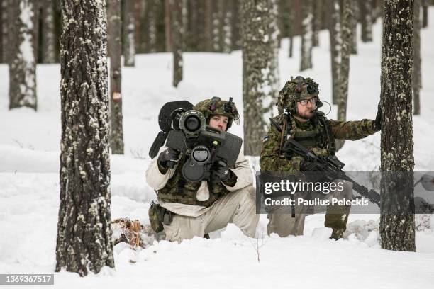 Members of Estonian army during military training together with United Kingdom soldiers at Central Training Area on February 8, 2022 in Lasna,...